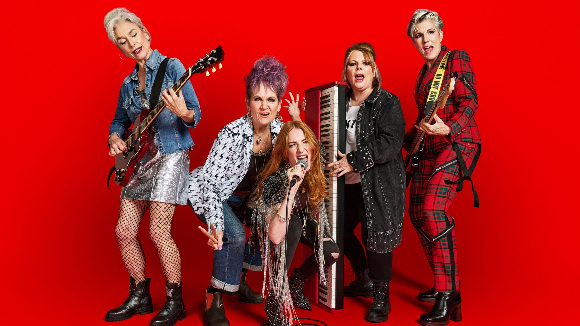 photo of the stars of the BBC's new show Riot Women against a red background 