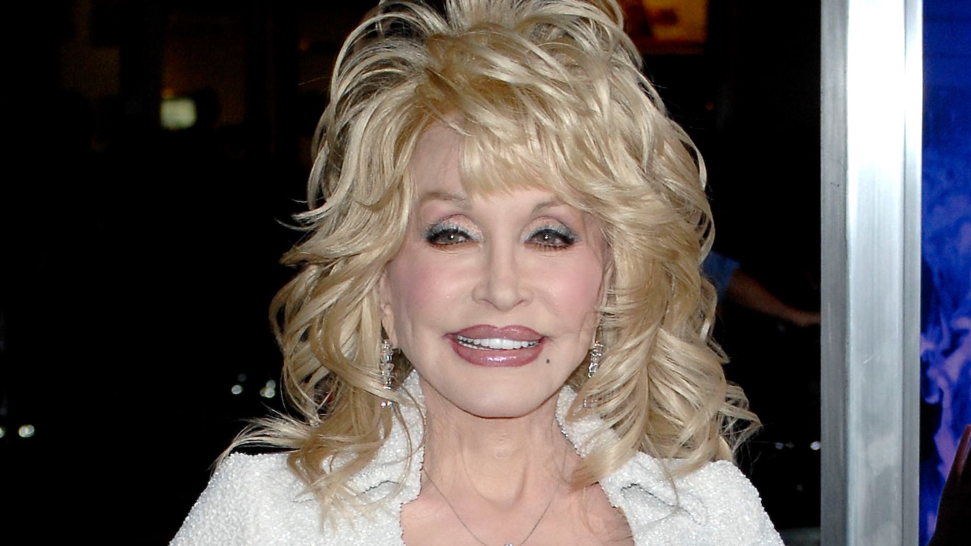Dolly Parton in a white dress