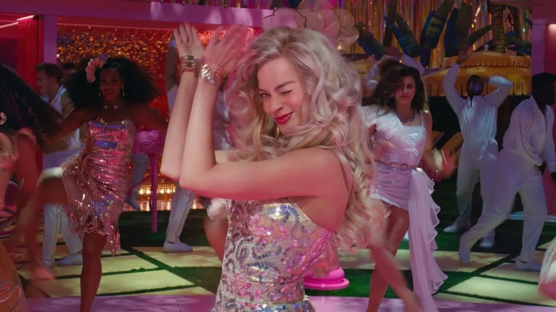 Margot Robbie dressed as disco Barbie at her party in Barbie Land