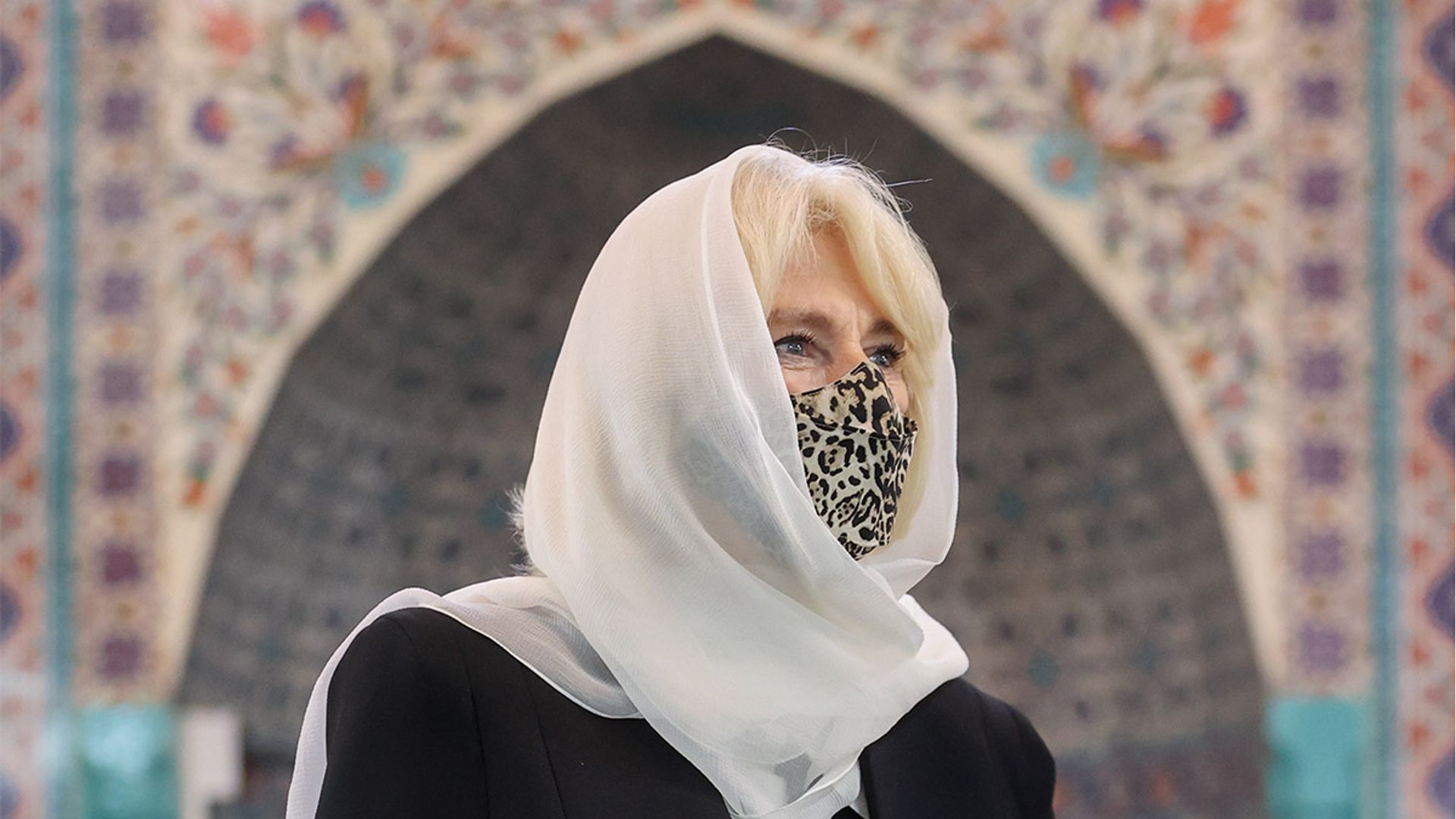The Duchess of Cornwall rocks white headscarf and unique faux fur accessory at London Mosque