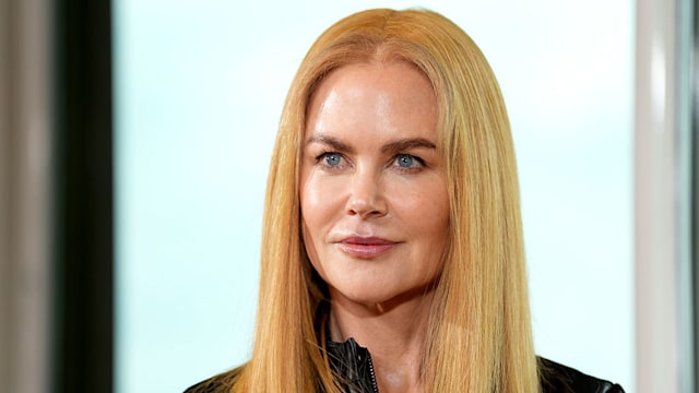 Nicole Kidman with blonde hair looking straight to camera 