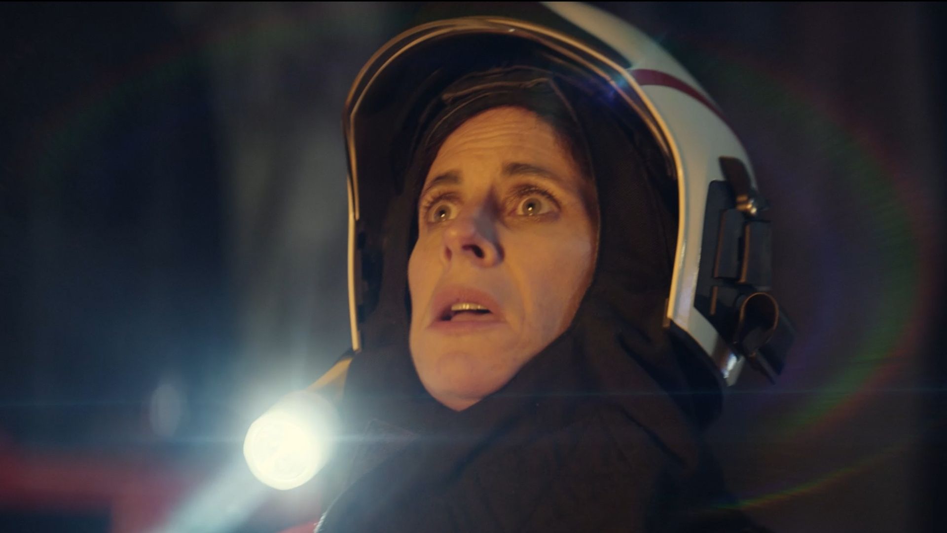 close-up of female firefighter looking shocked