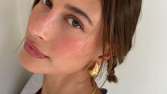 Hailey also has a script tattoo on her neck