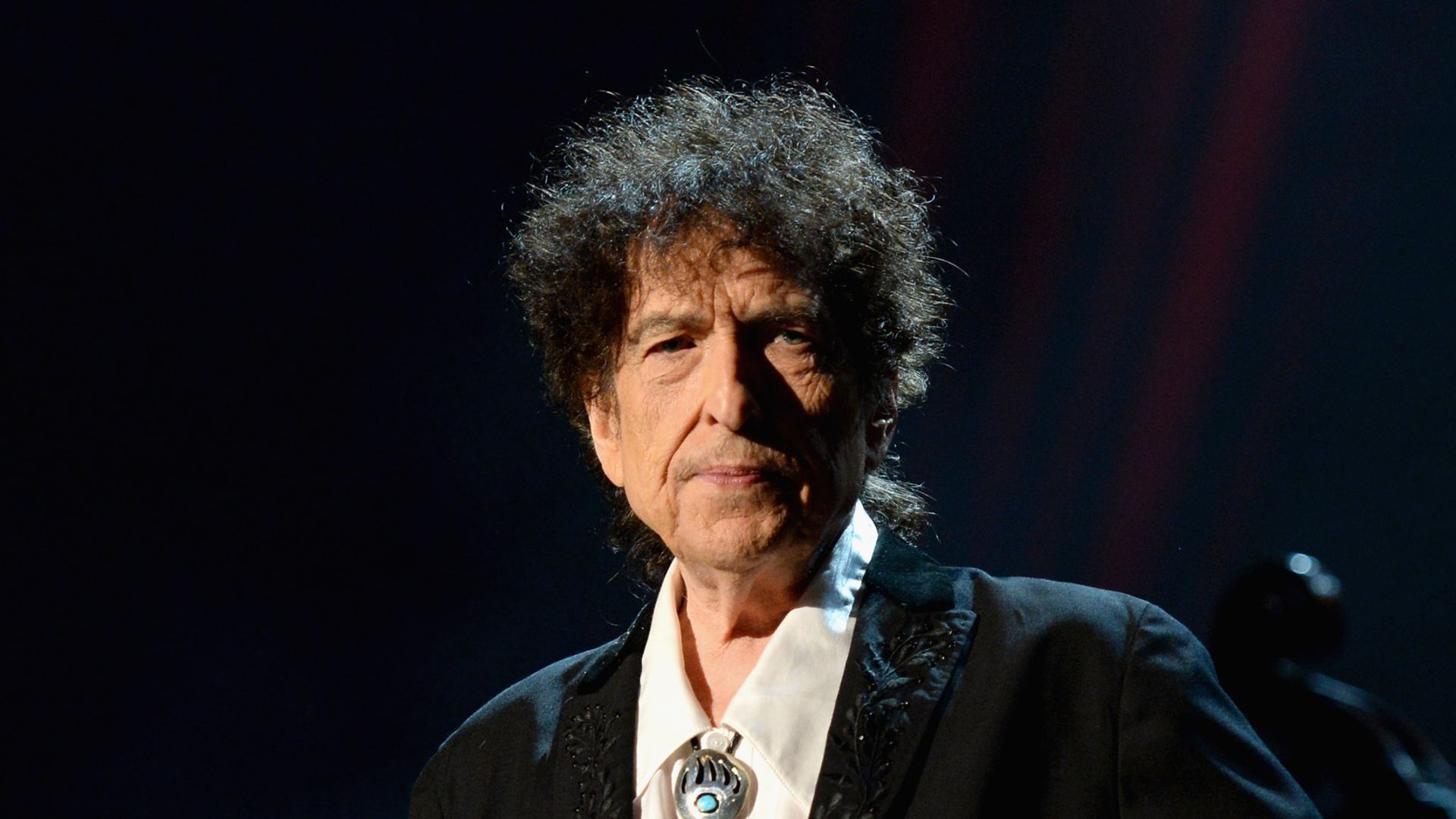 Honoree Bob Dylan speaks onstage at the 25th anniversary MusiCares 2015 Person Of The Year Gala honoring Bob Dylan at the Los Angeles Convention Center on February 6, 2015 in Los Angeles, California. The annual benefit raises critical funds for MusiCares' Emergency Financial Assistance and Addiction Recovery programs. For more information visit musicares.org