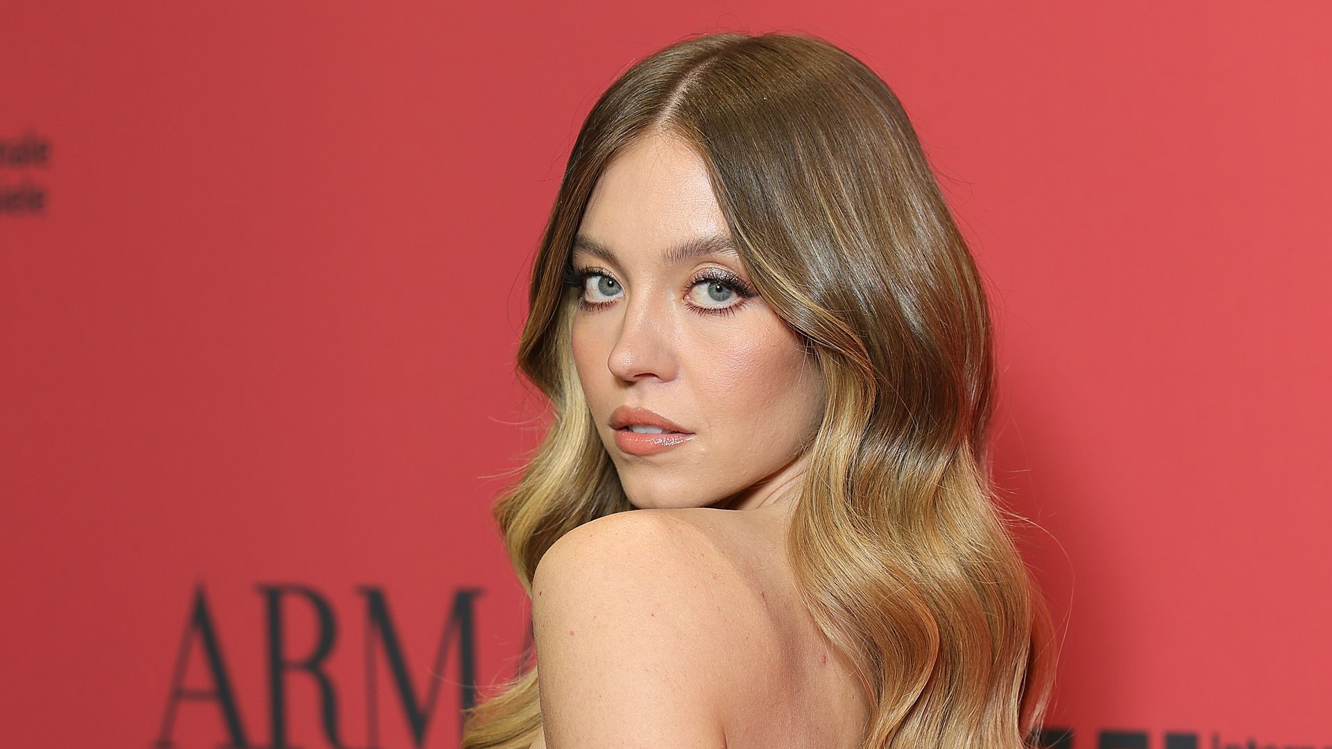 Sydney Sweeney oozes cool-girl bride energy in bejewelled strapless gown