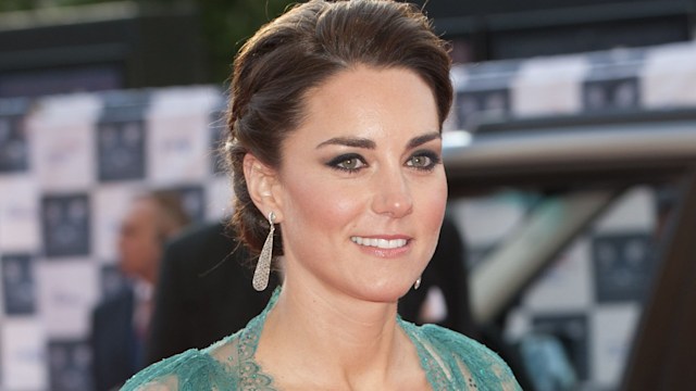 Kate middleton in teal gown waist up