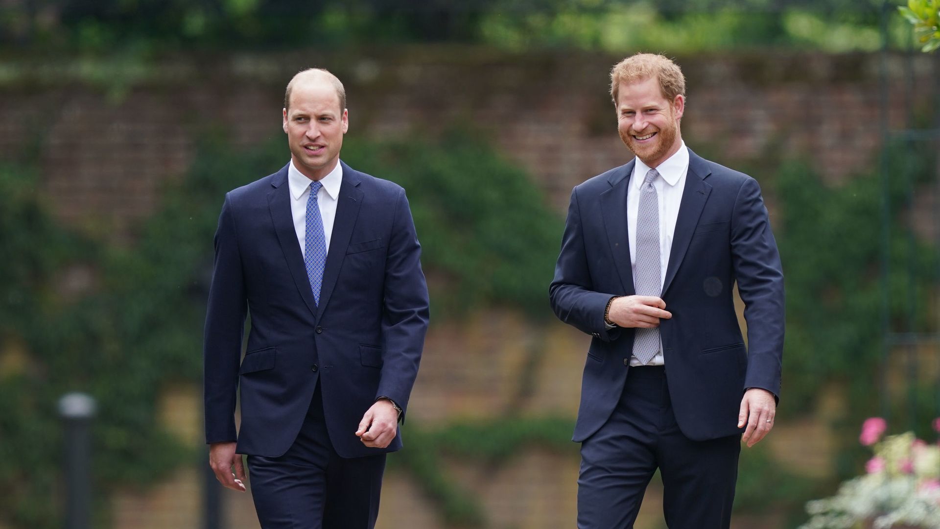 Prince William and Prince Harry arrive for the unveiling of a statue they commissioned of their mother Diana, Princess of Wales, in the Sunken Garden in 2021