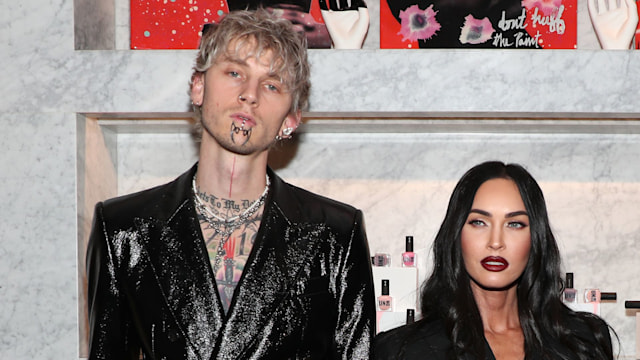 Machine Gun Kelly and Megan Fox in black