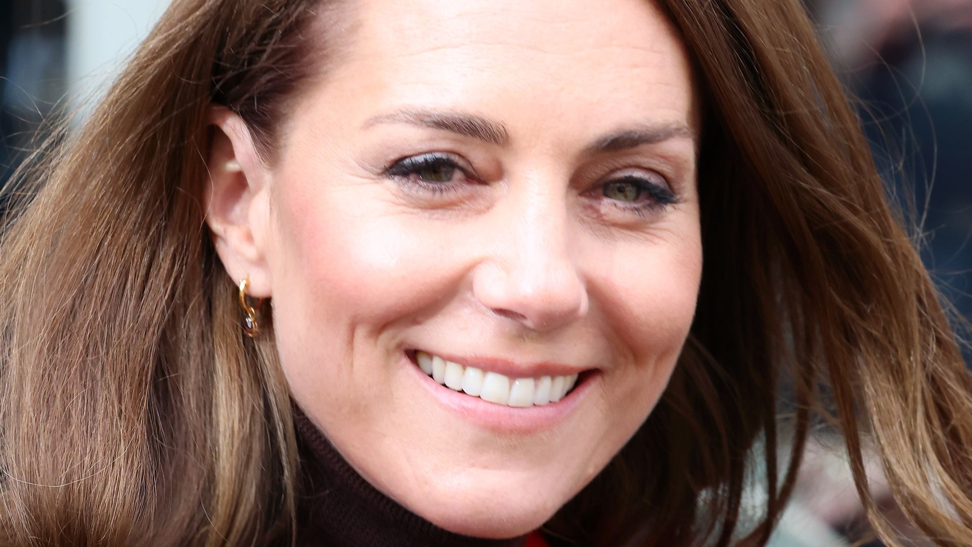 Catherine, Princess of Wales wears a red coat during a visit to Pontypridd Market on February 26, 2025 in Pontypridd, Wales.