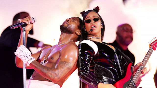 Usher and H.E.R. perform onstage during the Apple Music Super Bowl LVIII Halftime Show at Allegiant Stadium on February 11, 2024 in Las Vegas, Nevada