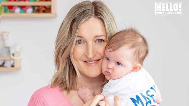 Lioness Ellen White cradles her baby girl as she introduces her to HELLO!