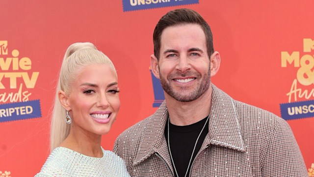 Heather Rae El Moussa and Tarek El Moussa attend the 2022 MTV Movie & TV Awards: UNSCRIPTED at Barker Hangar in Santa Monica, California and broadcast on June 5, 2022.