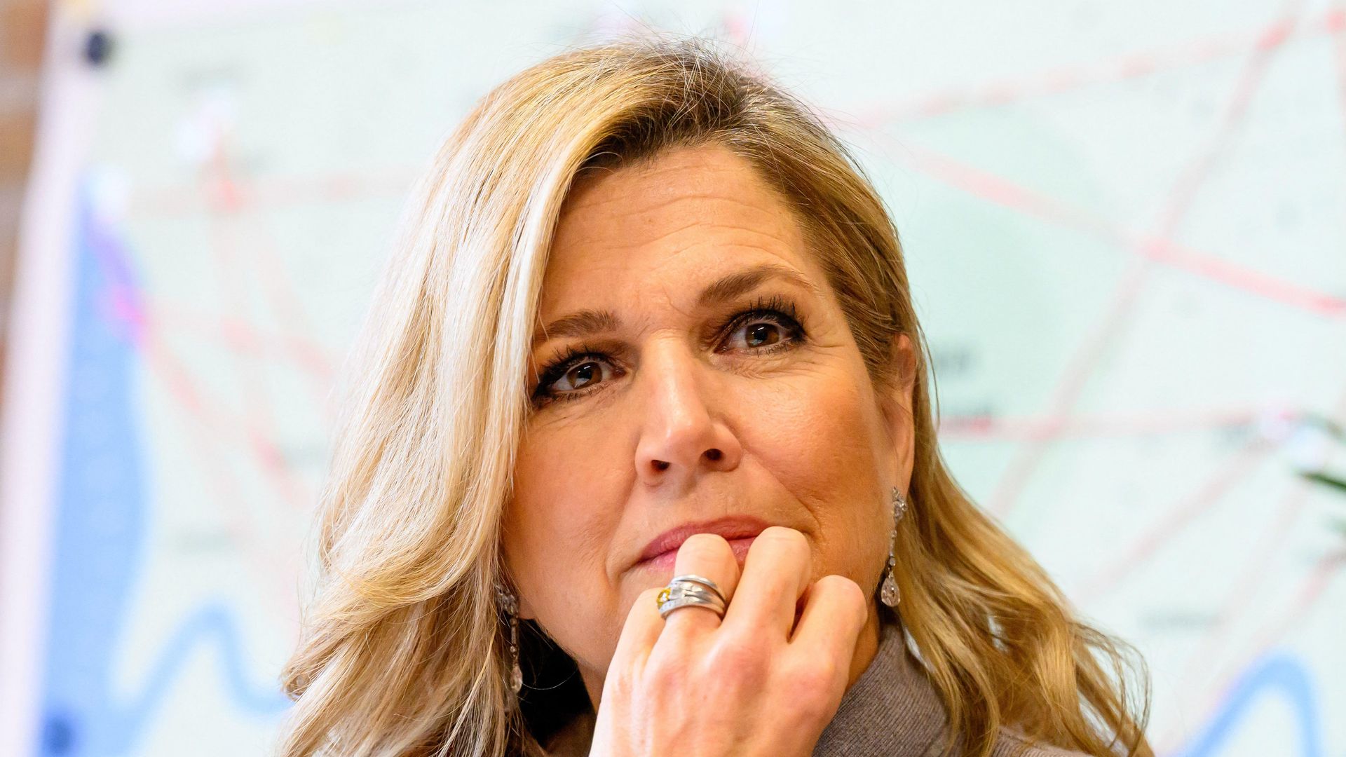 Queen Maxima close up with hand on chin