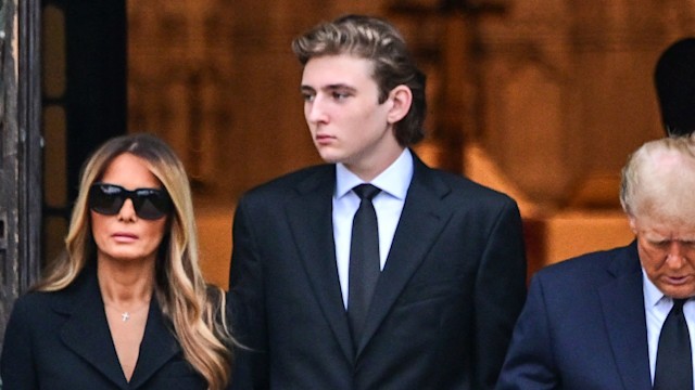 Former US President Donald Trump (R) stands with his wife Melania Trump (2L) their son Barron Trump (C) and father-in-law Viktor Knavs, at the start of a funeral for Amalija Knavs, the former first lady's mother, outside the Church of Bethesda-by-the-Sea, in Palm Beach, Florida, on January 18, 2024