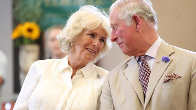 couple smiling in white