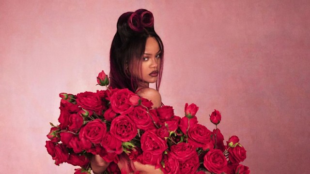 Rihanna poses for a Savage X Fenty campaign in a red lingerie set