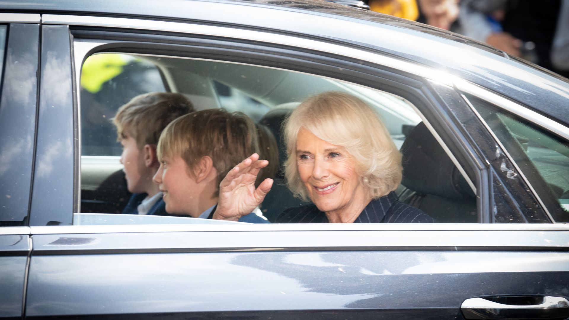 The Queen Consort leaves coronation rehearsal with her grandsons
