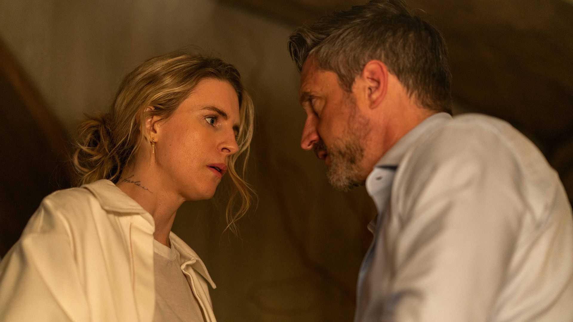 close-up of woman and man talking