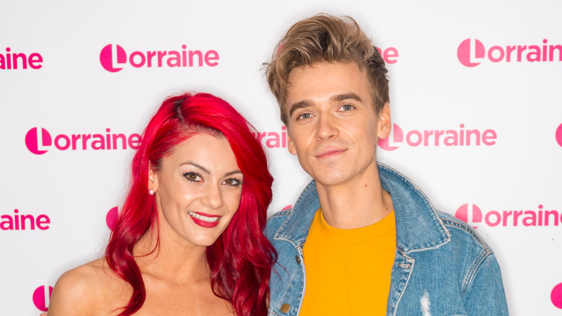 Dianne Buswell standing with Joe Sugg