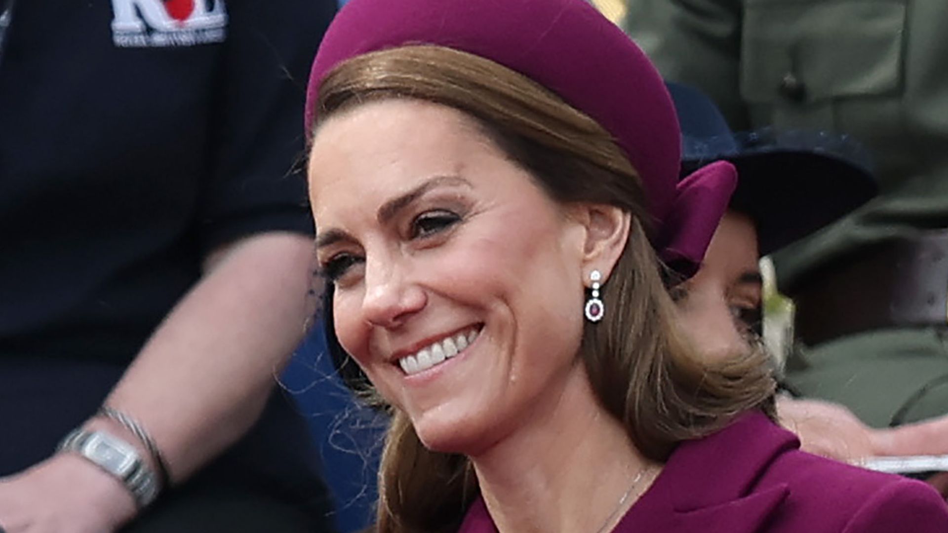 Princess Kate looks striking in purple pleats and sparkling rubies for family reunion
