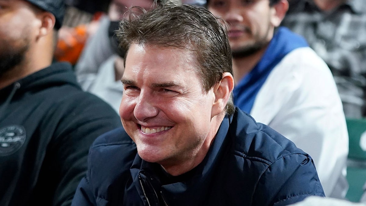 Tom Cruise surprises fans during outing with son Connor at Giants game