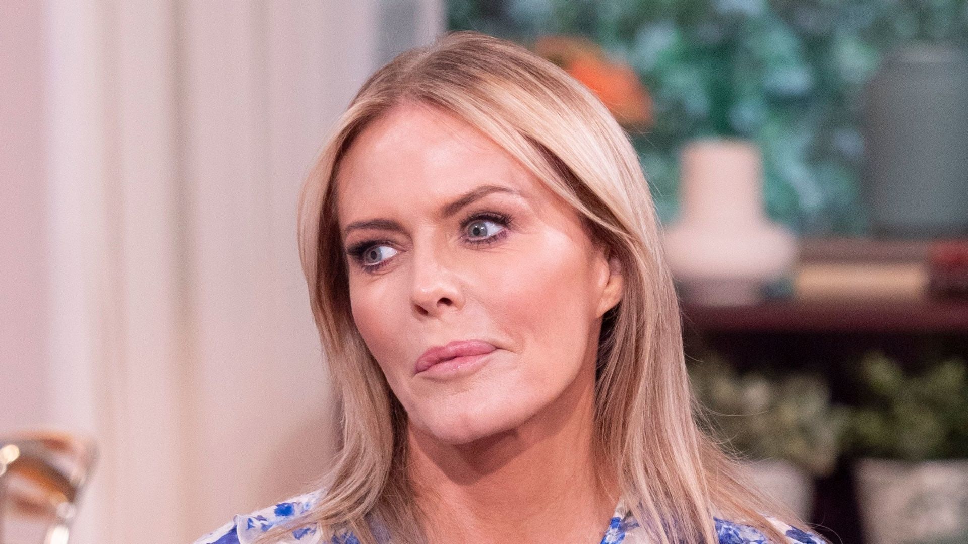 patsy kensit on this morning sofa in blue dress