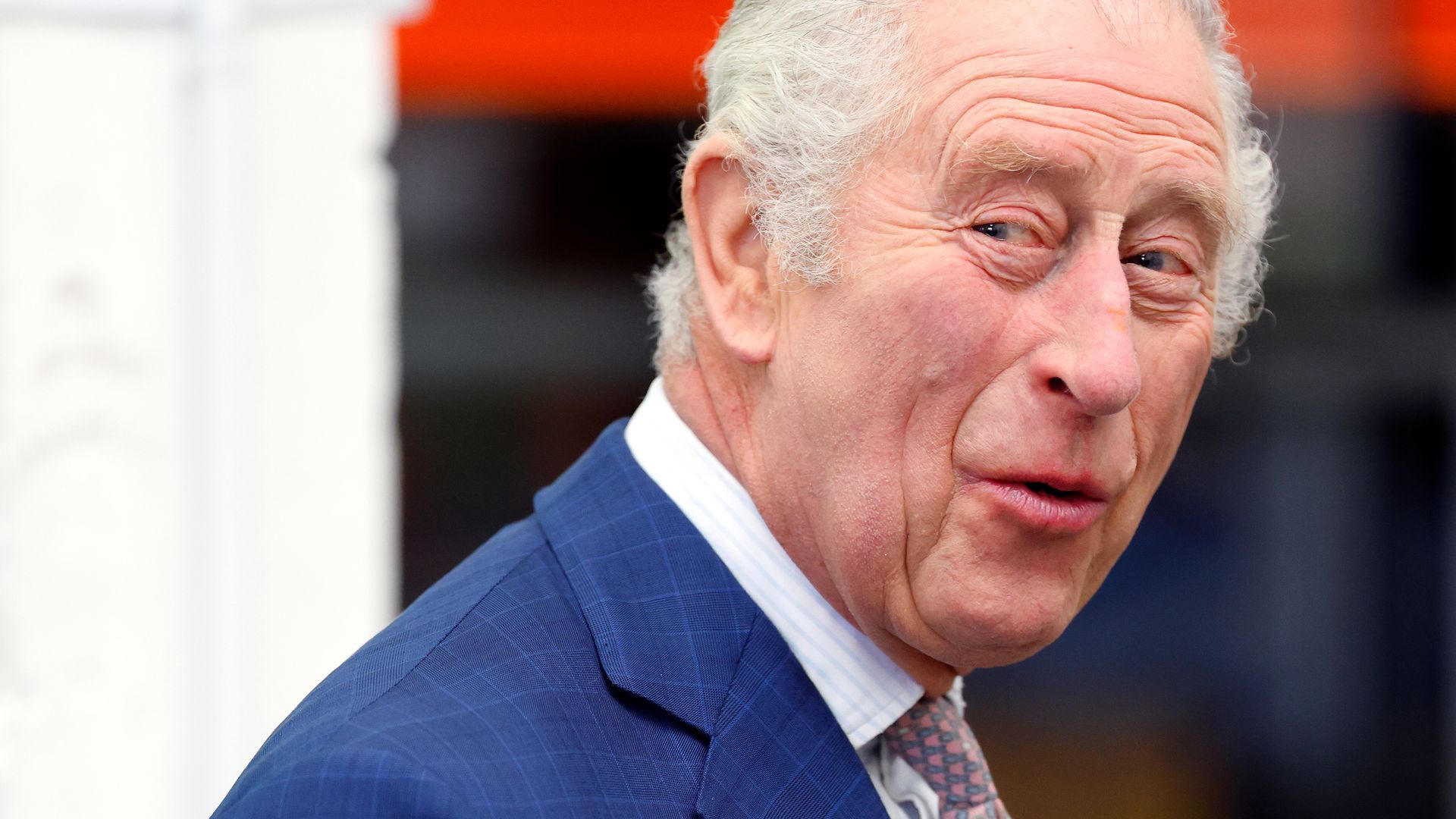 king charles in blue suit