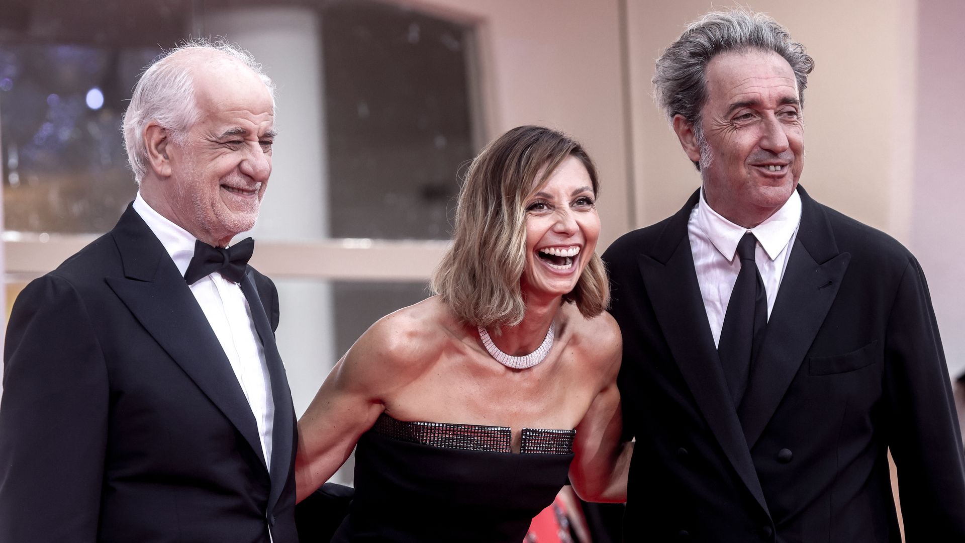 Toni Servillo, Anna Ferzetti, and Paolo Sorrentino attend the "La Grazia" red carpet during the 82nd Venice International Film Festival on August 27, 2025 in Venice, Italy.