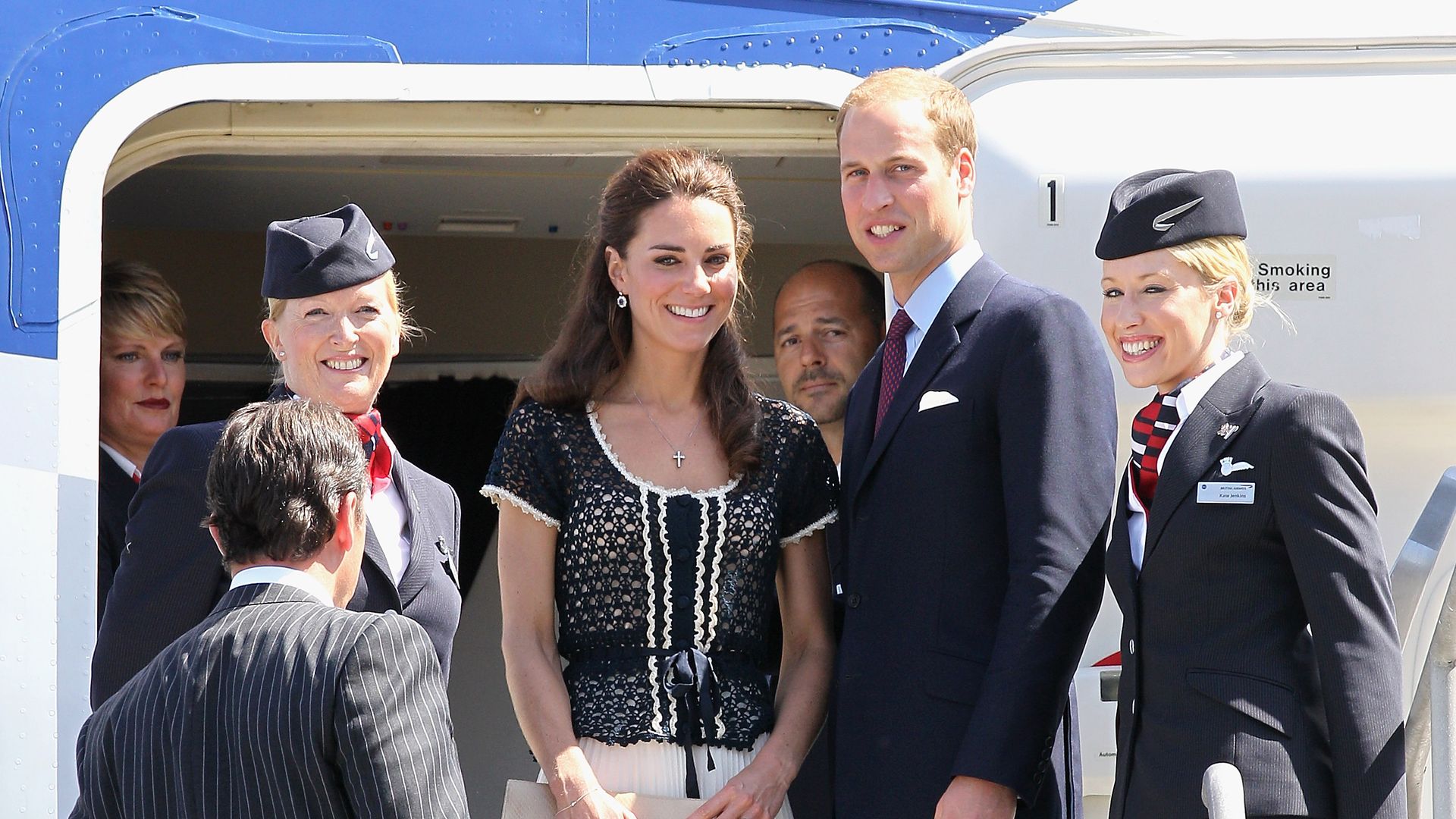 Kate Middleton and Prince William with British Airways stewardesses