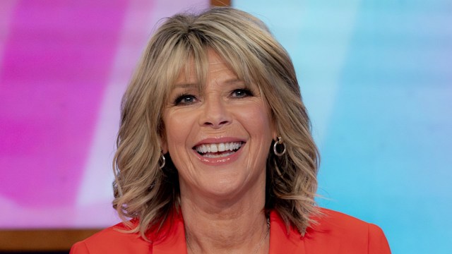 Ruth Langsford smiling in orange blazer