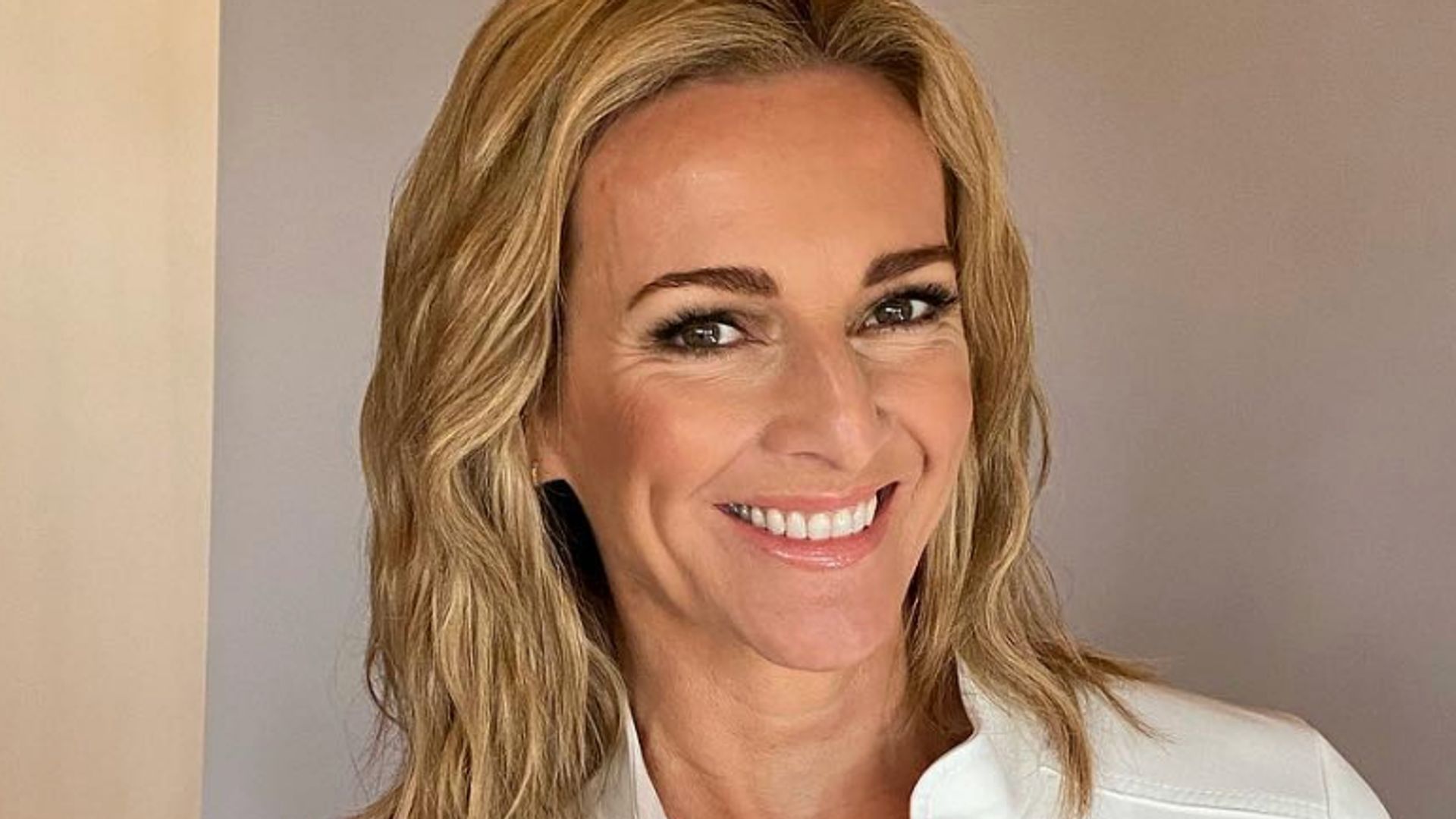Gabby Logan smiling to the camera