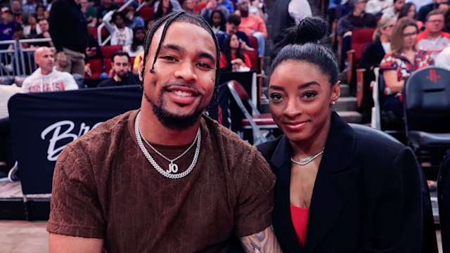 Simone Biles and Jonathan Owens attend basketball game