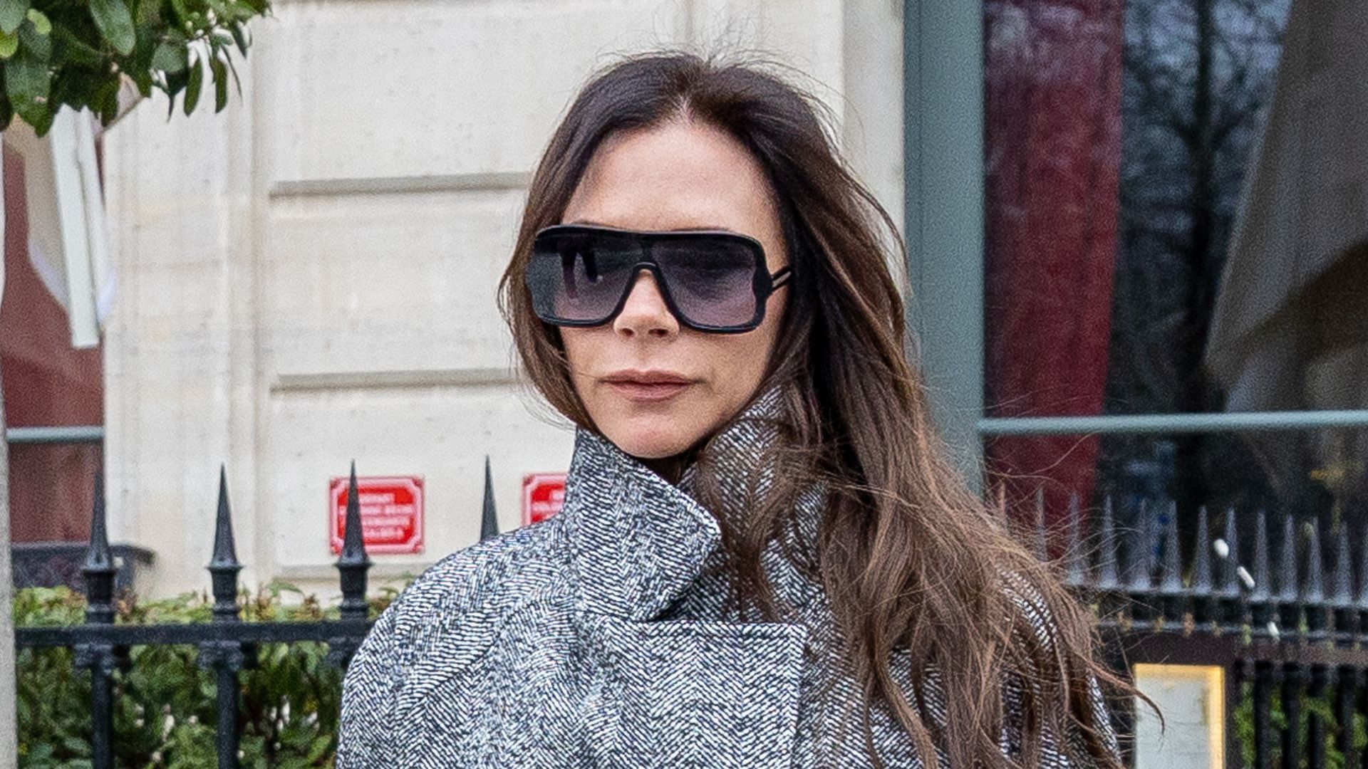 Victoria Beckham wrapped up in a warm coat