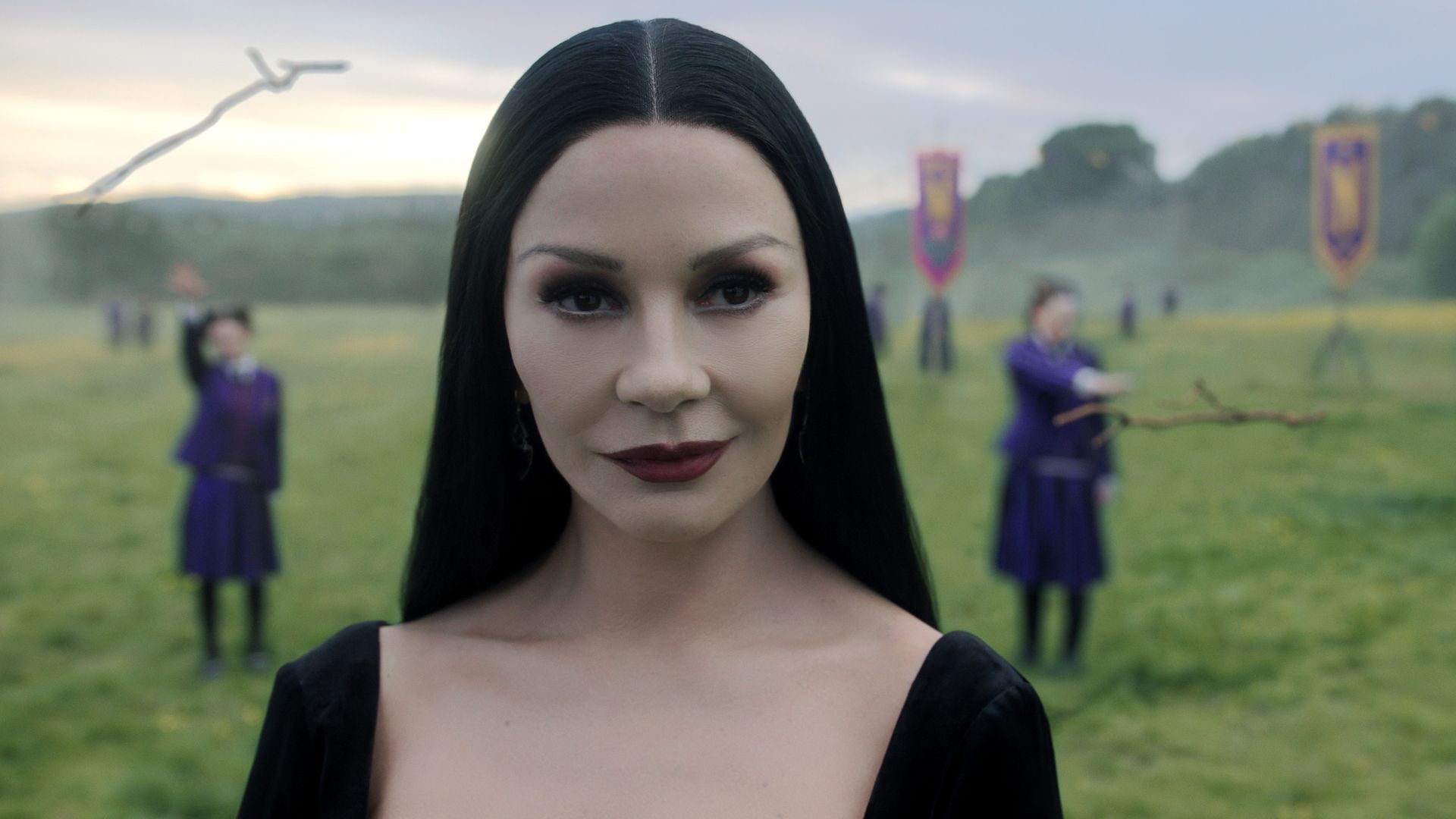 close-up woman with long dark hair in field