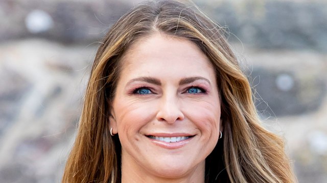 princess madeleine of sweden smiling in pink dress