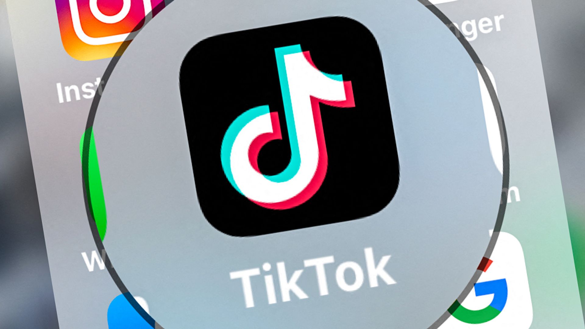 This photograph taken on March 23, 2022, shows logo of the networking application TikToK displayed on a tablet in Lille, northern France