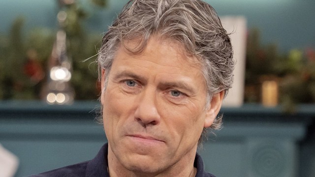 john bishop in navy top on talk show