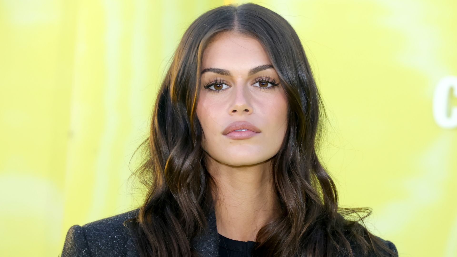 Kaia Gerber arrives at the premiere of Prime Video Series "Overcompensating" at Hollywood Palladium on May 14, 2025 in Los Angeles, California