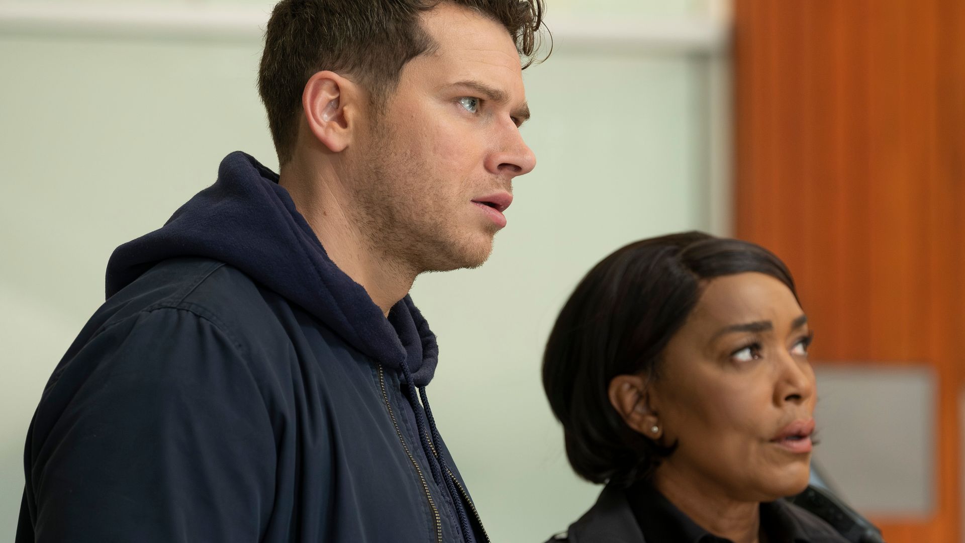 Oliver Stark and Angela Bassett in a scene from 911. Athena and Buck are in a race against time to rescue the rest of the 118 following the fire in the bio lab.