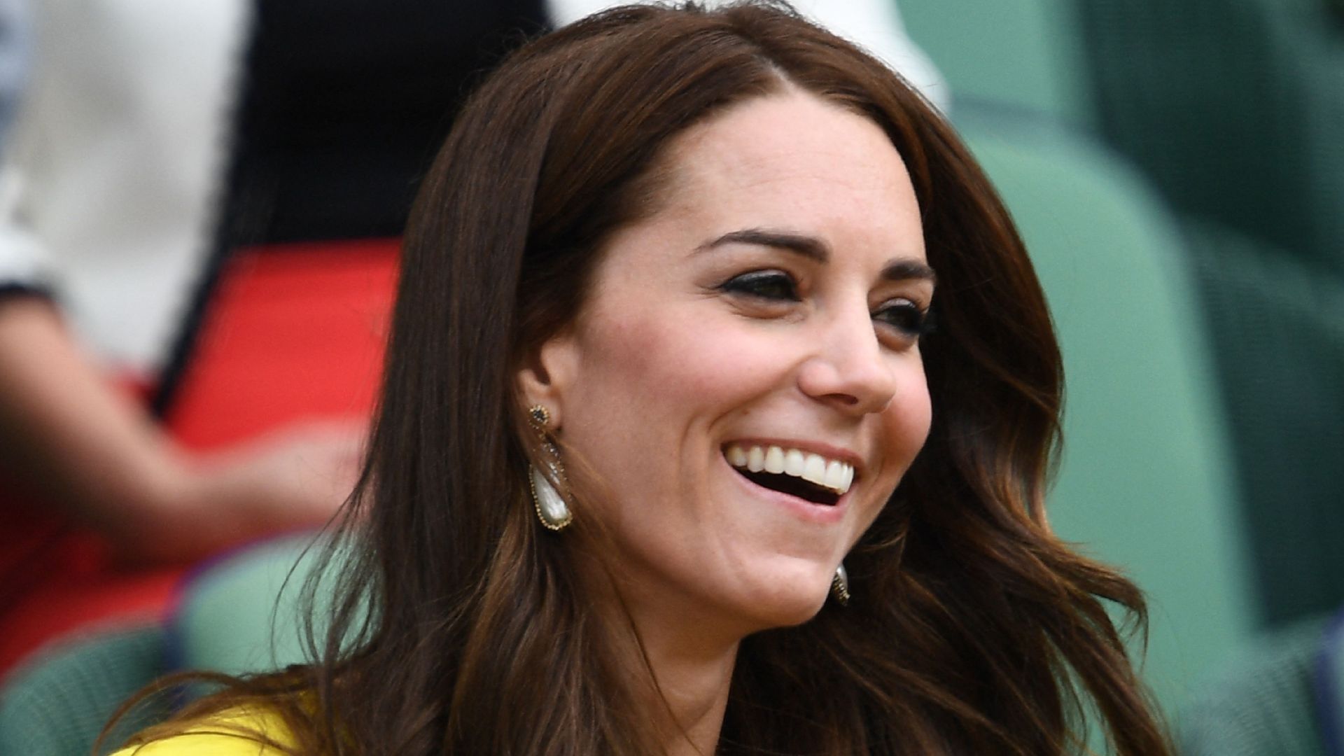 Kate Middleton arrives in the royal box on centre court during the women's semi-final matches on the eleventh day of the 2016 Wimbledon Championships at The All England Lawn Tennis Club in Wimbledon, southwest London, on July 7, 2016. 
