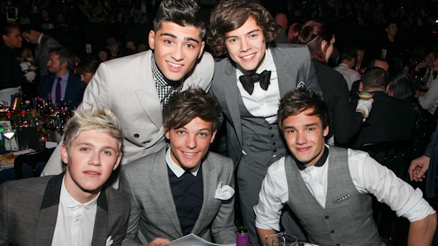 One Direction pose at tables during The BRIT Awards 2012  at The O2, on February 21, 2012 in London, England.