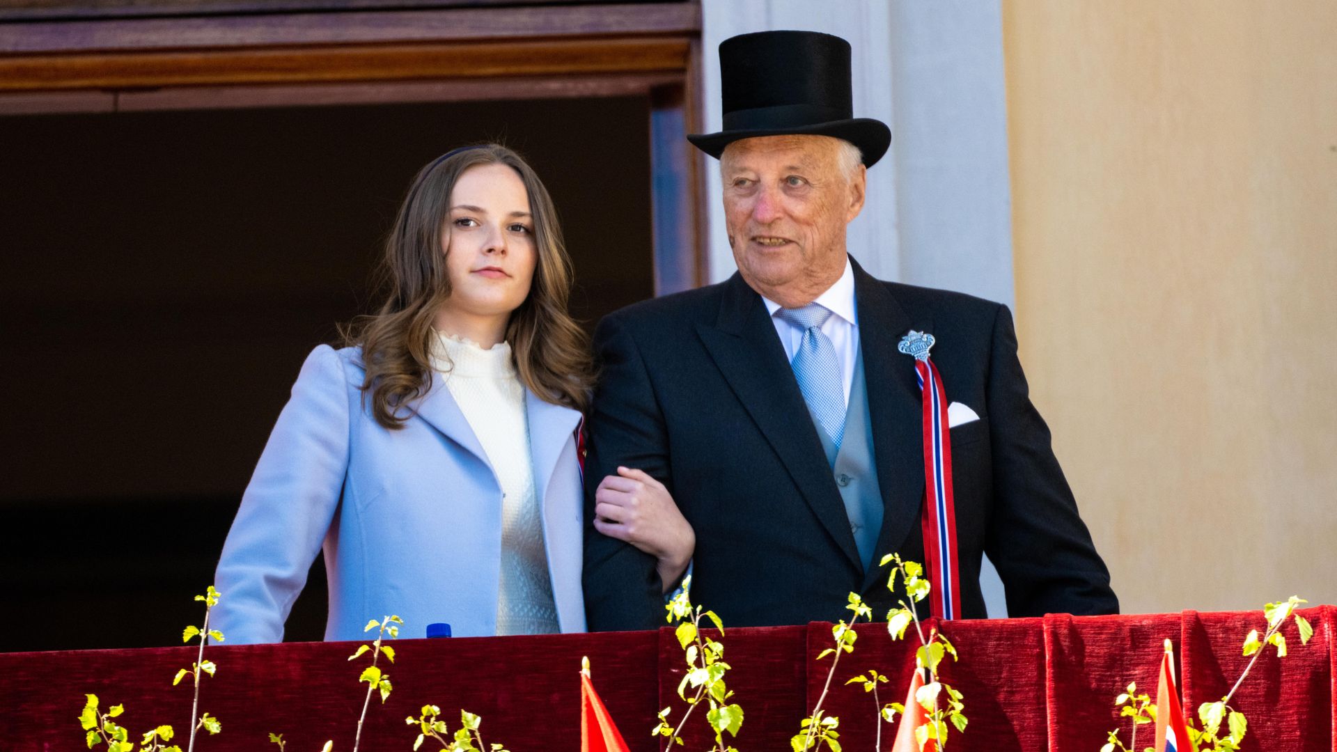 King Harald with Princess Ingrid Alexandra on palace balcony
