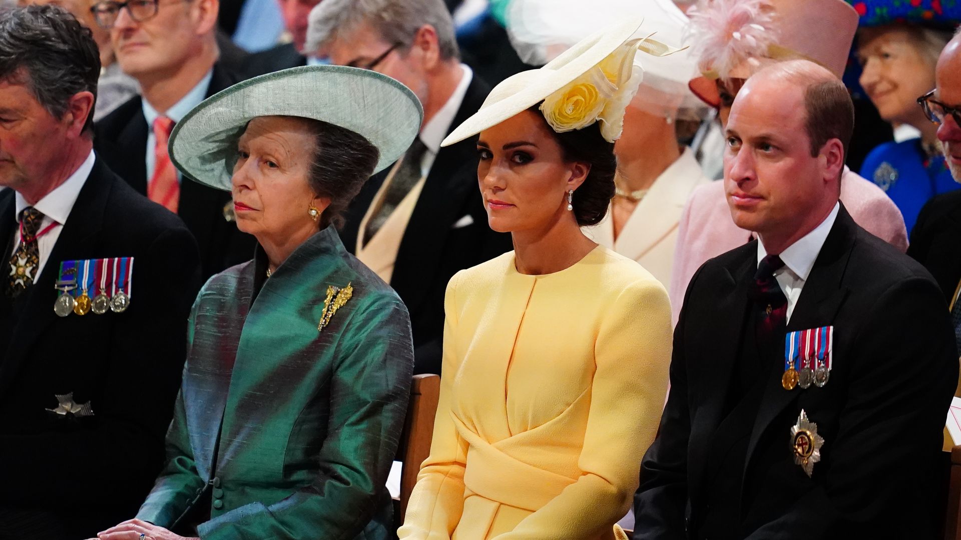 Princess Anne sitting with Kate Middleton and Prince William