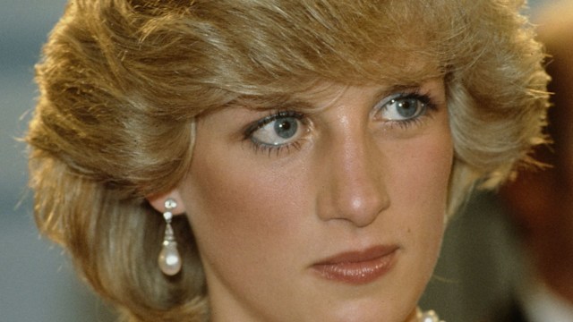 Princess Diana wearing pearl jewellery set and a Catherine Walker dress at a Gala concert hall in Melbourne, Australia, 14th April 1983.