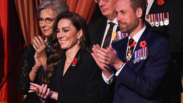 Britain's Catherine, Princess of Wales (L) and Britain's Prince William, Prince of Wales (R) attend "The Royal British Legion Festival of Remembrance" ceremony at Royal Albert Hall