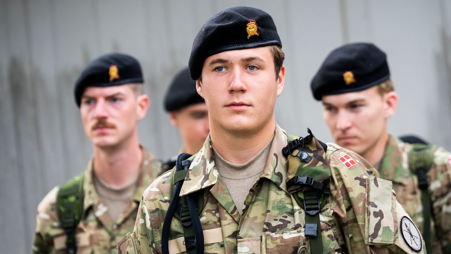 Crown Prince Christian in military uniform with other trainees