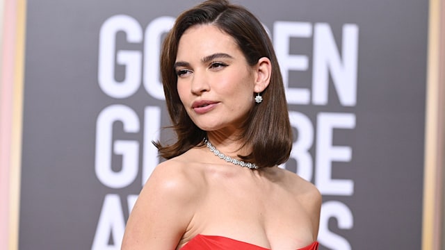 lily james wearing diamond necklace