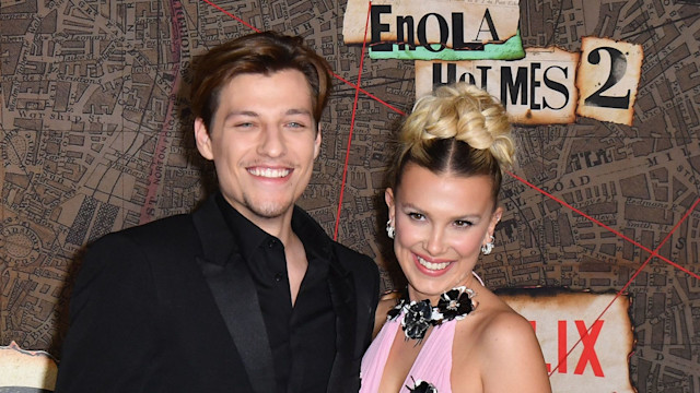 Jake Bongiovi (L) and British actress Millie Bobby Brown arrive for the premiere of Netflix's "Enola Holmes 2" at The Paris Theatre in New York City on October 27, 2022.