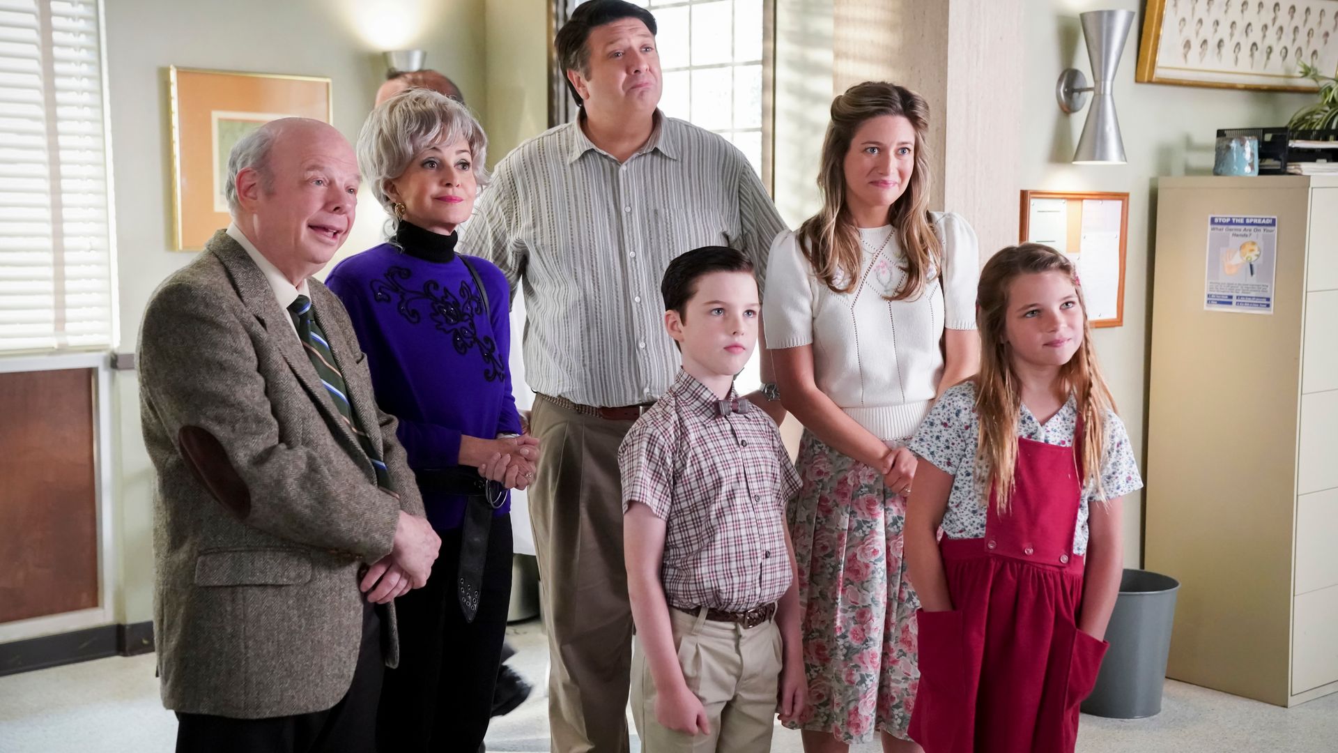 Dr. Sturgis (Wallace Shawn), Meemaw (Annie Potts), George Sr. (Lance Barber), Sheldon (Iain Armitage), Mary (Zoe Perry) and Missy (Raegan Revord) in  Young Sheldon