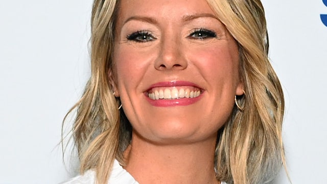 Dylan Dreyer wearing a white top